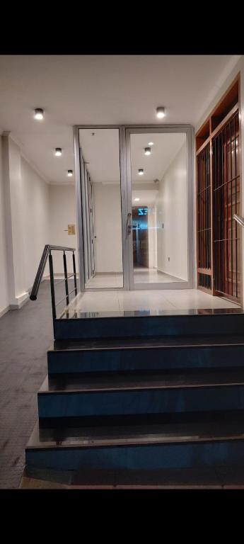 a group of blue stairs in a building at Lindo recuerdos in Posadas