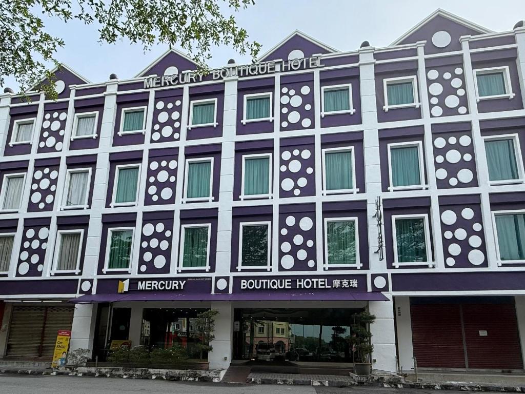a building with a black and white building at Mercury Boutique Hotel in Malacca