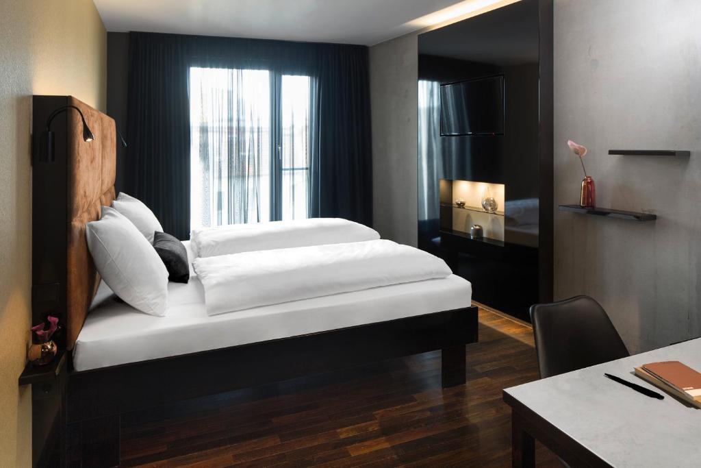 Postel nebo postele na pokoji v ubytování Hotel ZOE by AMANO