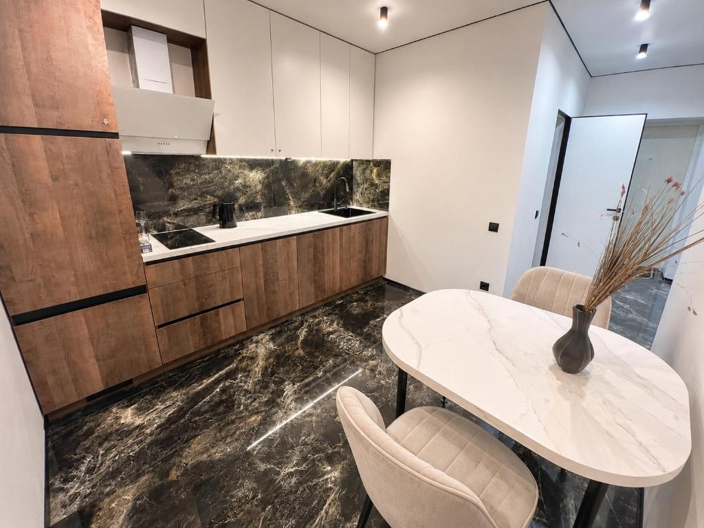 Стильні апартаменти в районі автовокзалу ЖК Great House Парковка головне фото
