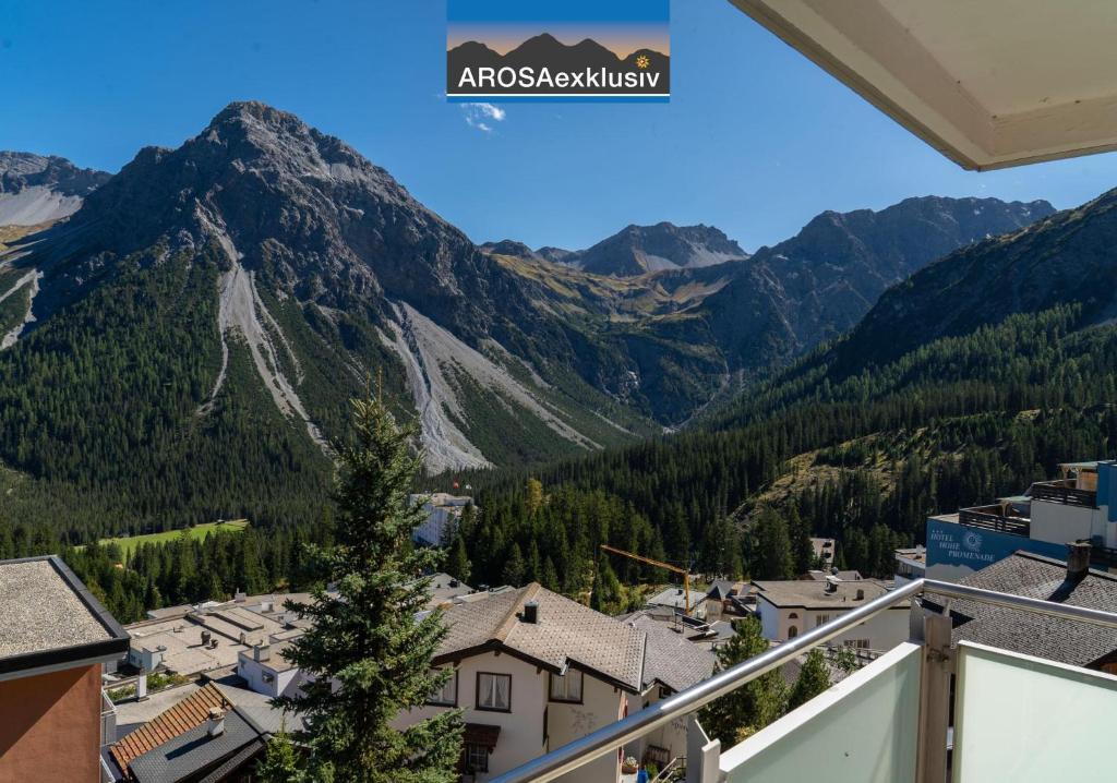 a view of the mountains from the balcony of the apartment at Edelweiss in Arosa