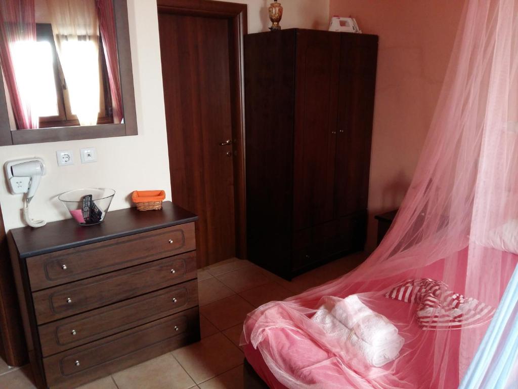 Postel nebo postele na pokoji v ubytování Magda Studios