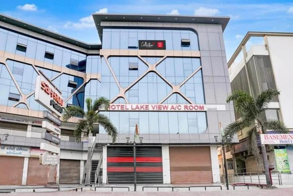 a building with a sign that reads office lake view view age room at Hotel Lakeview Vadodara in Vadodara
