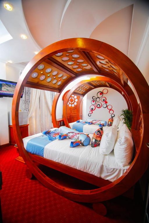 Postel nebo postele na pokoji v ubytování Hotel White House