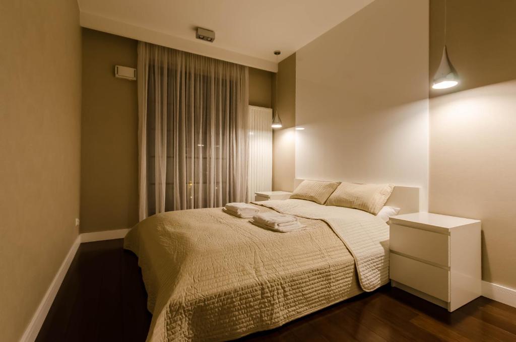 Posteľ alebo postele v izbe v ubytovaní Old Town Luxury Apartment
