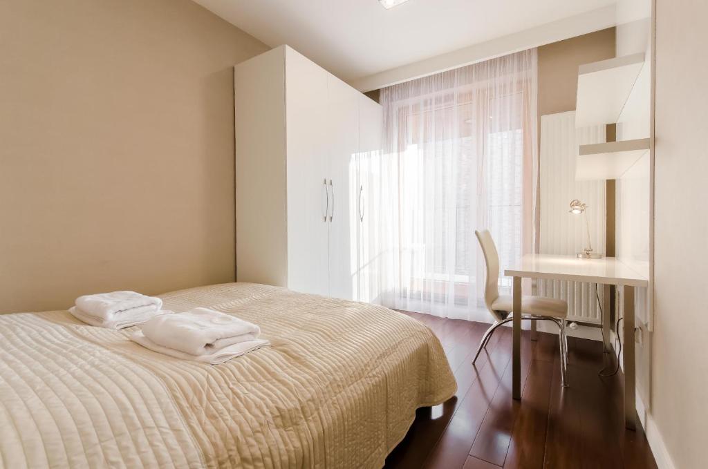 Posteľ alebo postele v izbe v ubytovaní Old Town Luxury Apartment