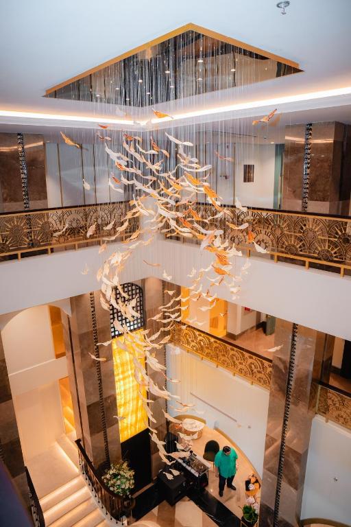 an overhead view of a lobby with a chandelier at Radiant Hotel and Events in San Fernando
