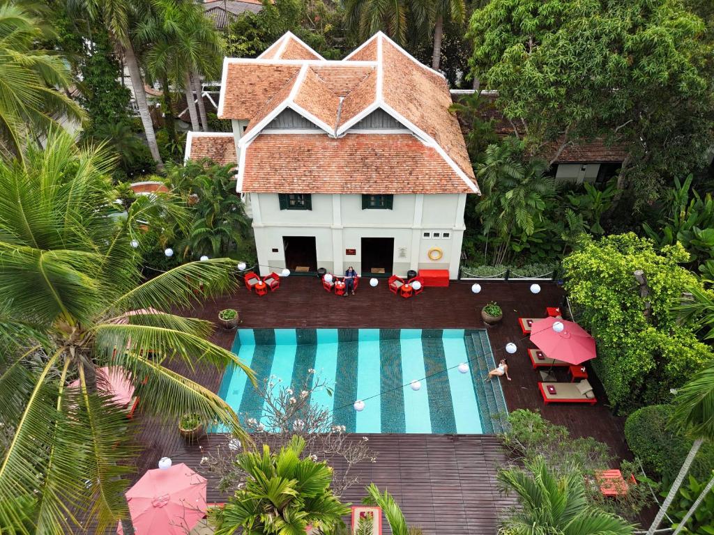 an aerial view of a resort with a swimming pool at Villa Maly Boutique Hotel in Luang Prabang