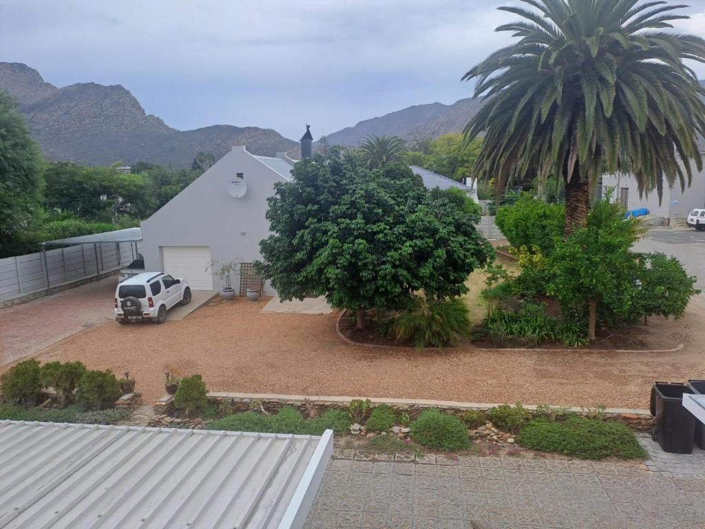 an aerial view of a church with a car parked in a driveway at Kings Place Montagu in Montagu