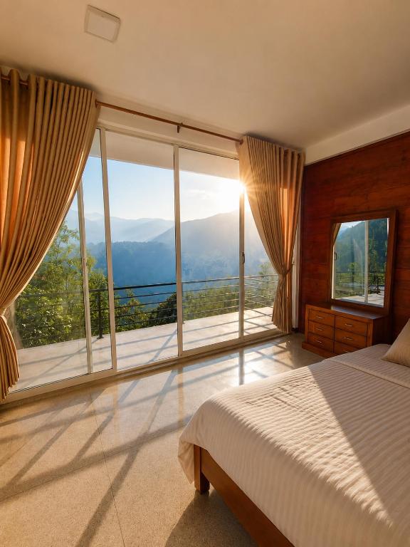 a bedroom with a bed and a large window at RT Point Gombamiya Hotel Kandy in Huluganga