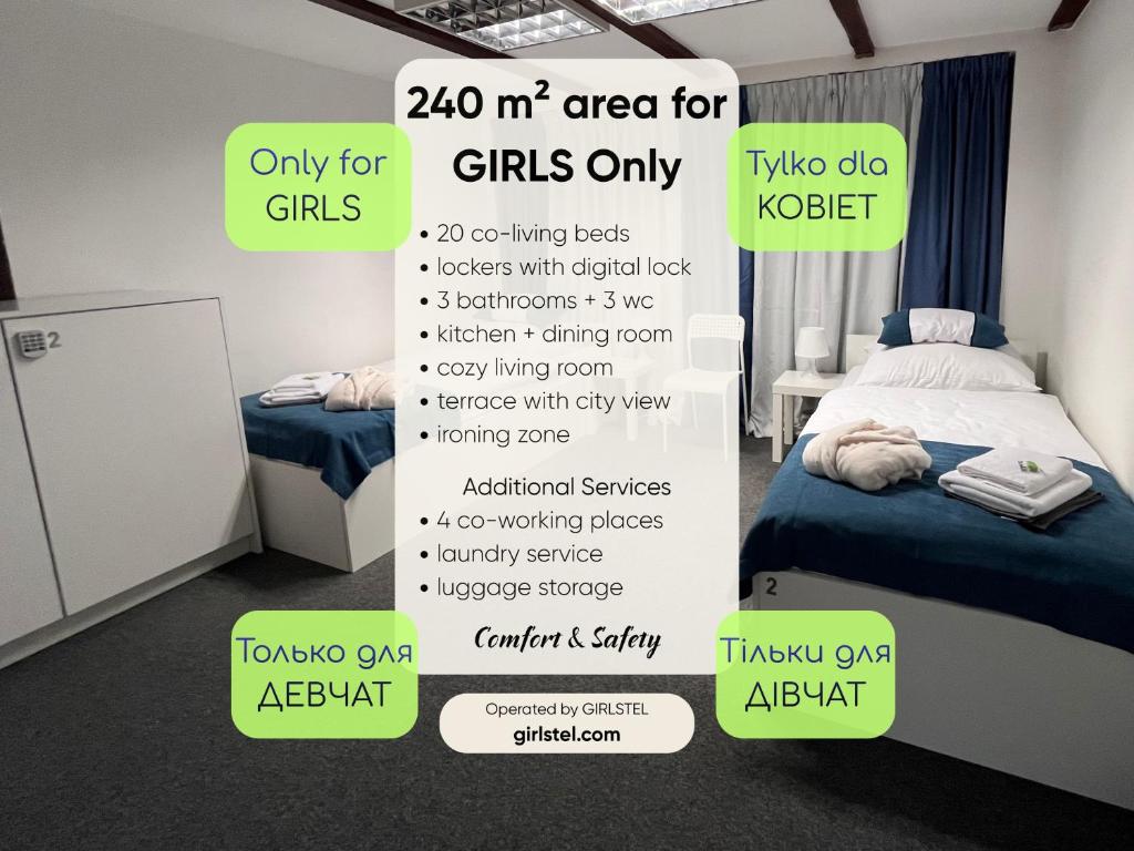 a room with a bed and a sign that says m area for girls only at GIRLSTEL Wrocław - Girls ONLY Space in Wrocław