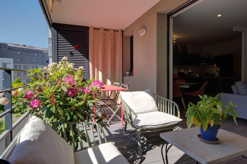 T3 2 chambres avec balcon et place de stationnement