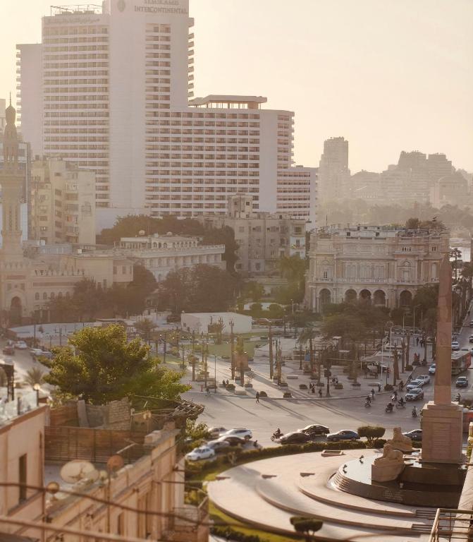 a view of a city with buildings and a street at tourist hotel cairo downtown in Cairo