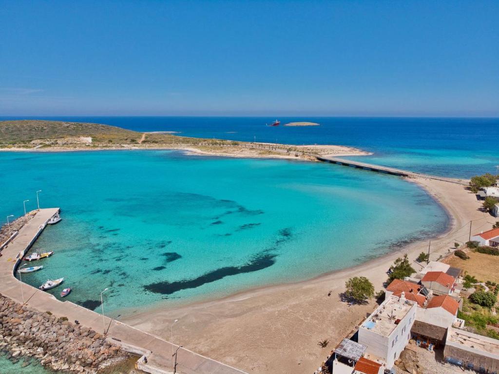 an aerial view of a beach with blue water at Diakofti Loft - Sea Breeze in Kythira