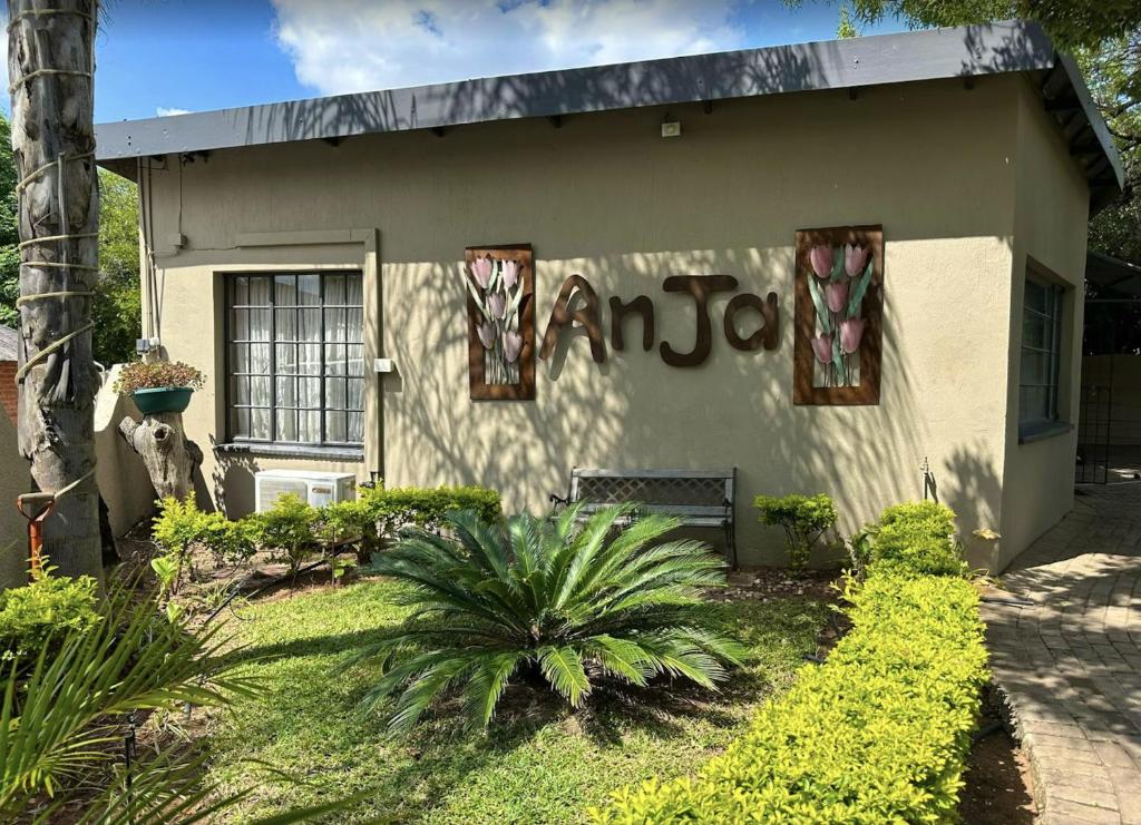 a building with the word zombie painted on it at Anja Guesthouse in Modimolle