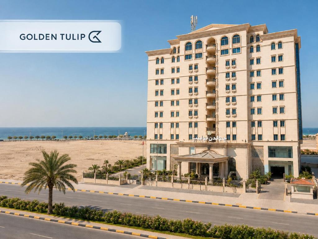 a rendering of a hotel with the ocean in the background at Golden Tulip Al Khobar in Al Khobar