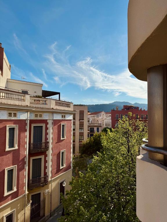 a view of a city with buildings and trees at Apartamentos en la rambla in Sant Feliu de Guíxols