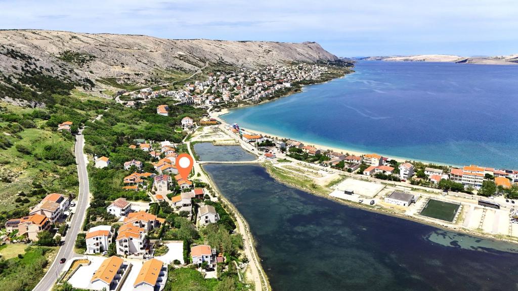 an aerial view of a small town next to the water at House Pag Vacation House in Pag