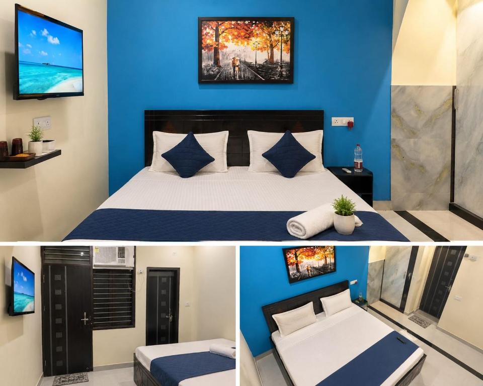 a hotel room with a bed and a tv at The Grand Blue Hotel in Greater Noida