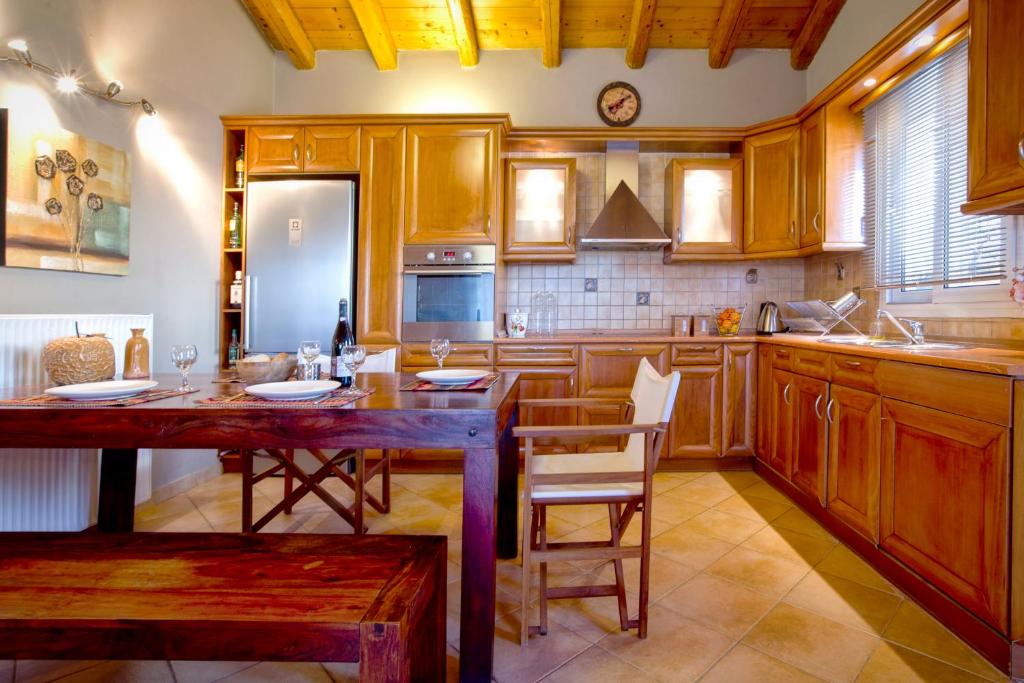 Kuchyň nebo kuchyňský kout v ubytování Villa Caramel