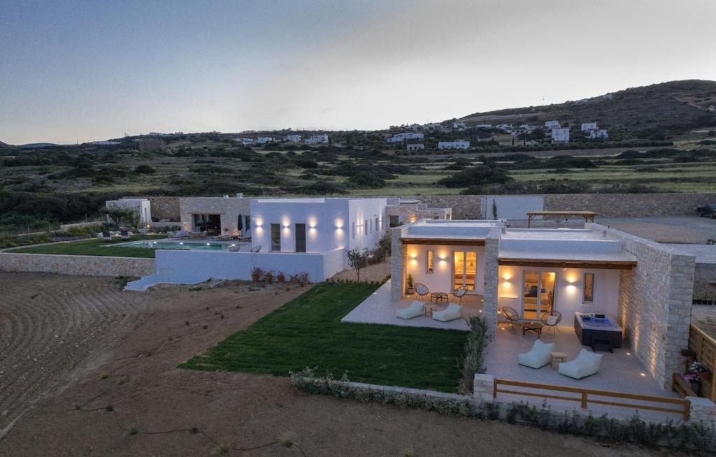an aerial view of a house with lights at Sunshine Alkyoni Suite in Isterni