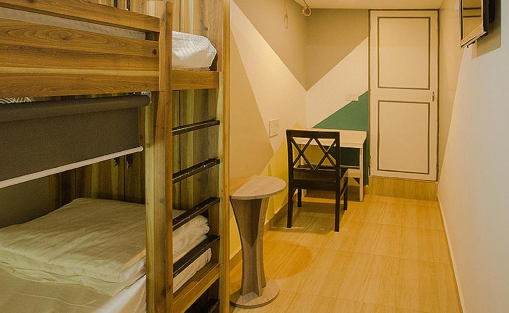 Postel nebo postele na pokoji v ubytování Pod N Beyond Smart Hotel