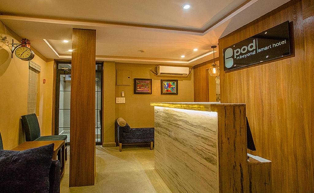 TV a/nebo společenská místnost v ubytování Pod N Beyond Smart Hotel
