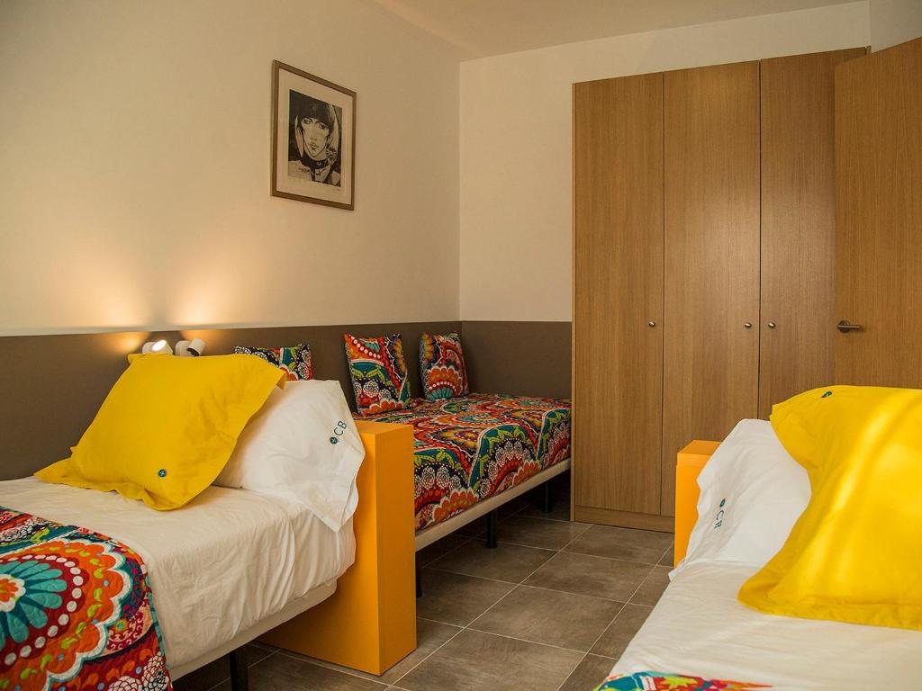 Postel nebo postele na pokoji v ubytování Villas Medes Mar - Plus Costa Brava