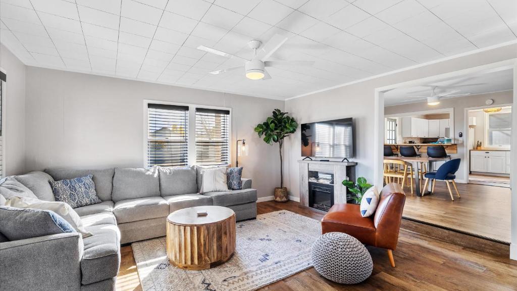 a living room with a couch and a table at West Bench Retreat in Red Lodge