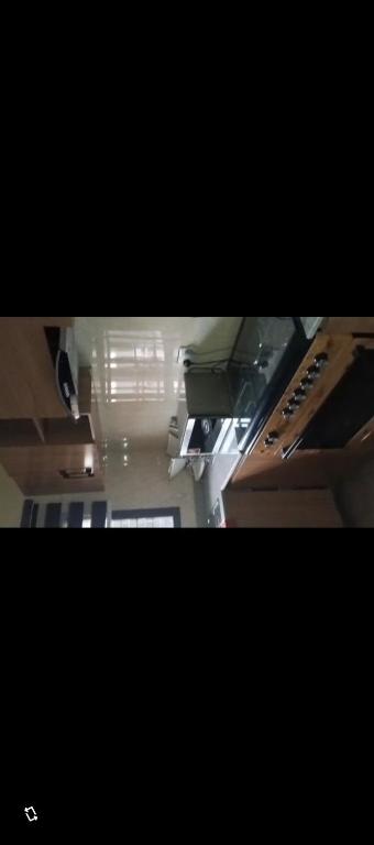an overhead view of a room with a kitchen at Fo1 Apartment in Karsana