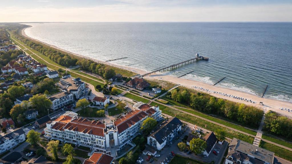 an aerial view of a beach and a pier at ZingstUrlauber in Zingst
