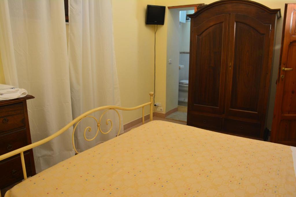 Łóżko lub łóżka w pokoju w obiekcie Villa Regina