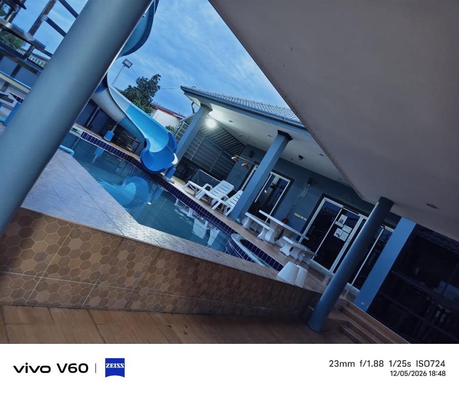 a view of a swimming pool in a house at Splash Paradise Villa in Cha Am