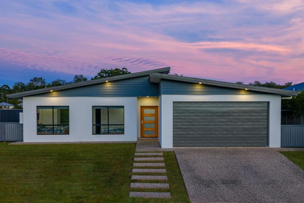 a rendering of a house with a garage at The Village HQ in Yungaburra