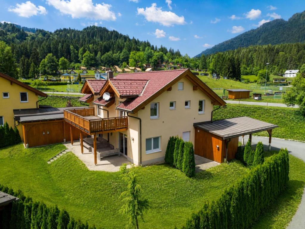 an aerial view of a house with a yard at Villa Alpenrose in Kötschach