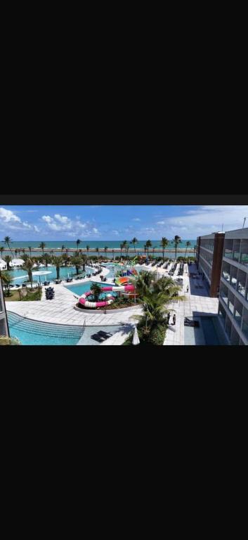 a view of a pool at a resort at Gave risort Porto life 2 in Porto De Galinhas