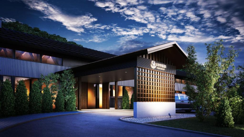a rendering of a building with a driveway at らうす餐荘 in Rausu