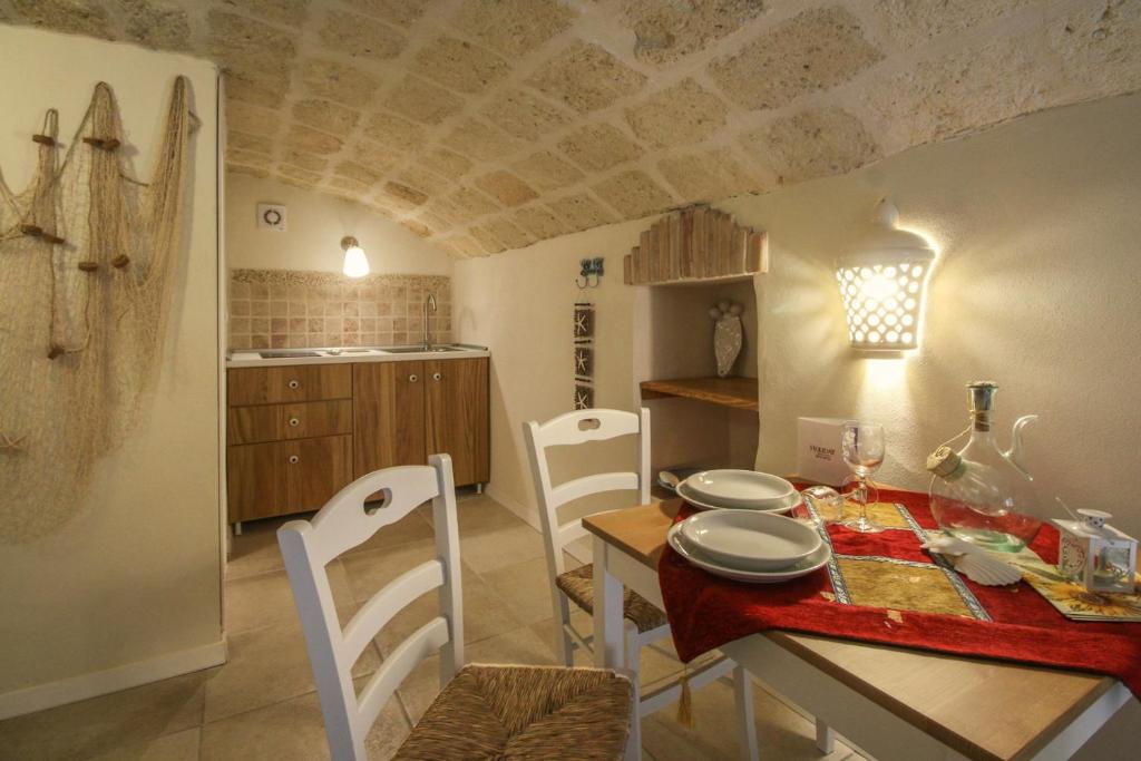 Kuchyň nebo kuchyňský kout v ubytování HolidayMonopoli