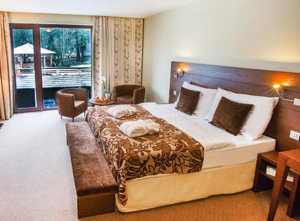 Postel nebo postele na pokoji v ubytování Hotel Zochova Chata - Adult friendly