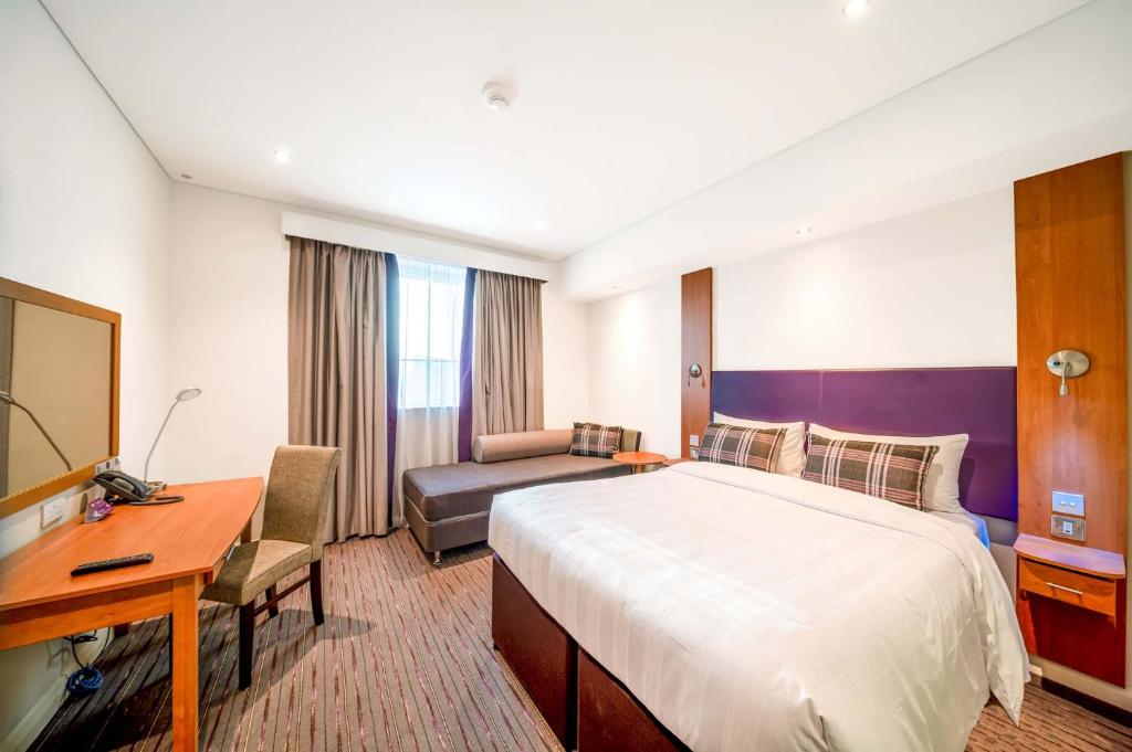 تصویر اتاق‌های Premier Inn Abu Dhabi Airport Business Park - تصویر ۲