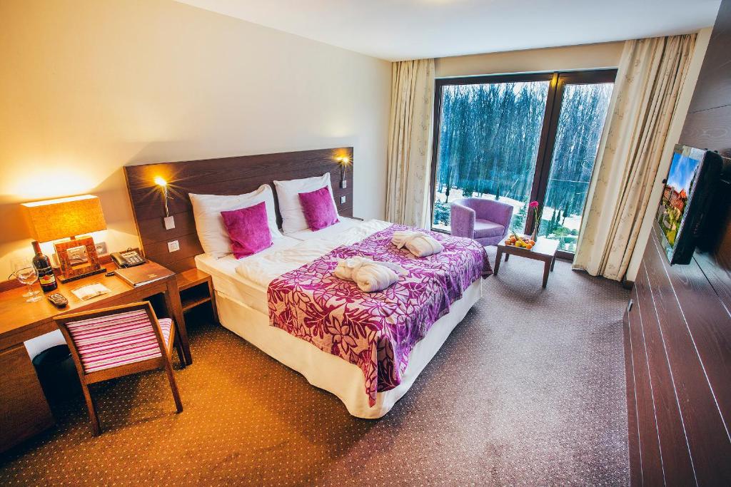 Postel nebo postele na pokoji v ubytování Hotel Zochova Chata - Adult friendly