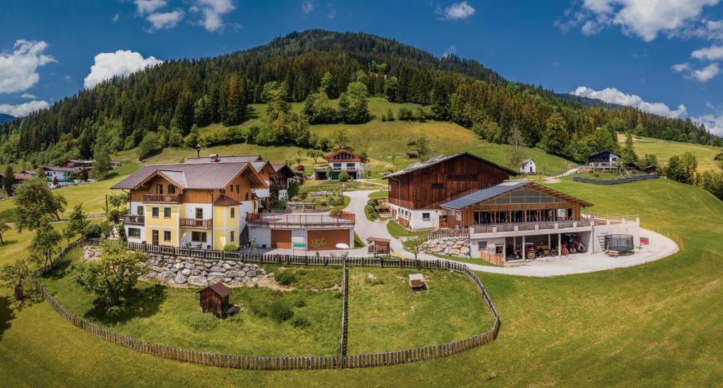 an aerial view of a house on a hill at Bauernhof Unterbichl in Flachau