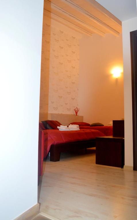 Postel nebo postele na pokoji v ubytování Abraxia B&B