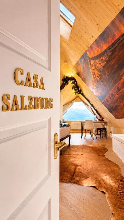 a door with a sign that reads casa salvo at CASA Salzburg in Salzburg