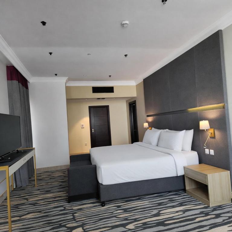 تصویر اتاق‌های Ramada by Wyndham Doha Old Town - تصویر ۲