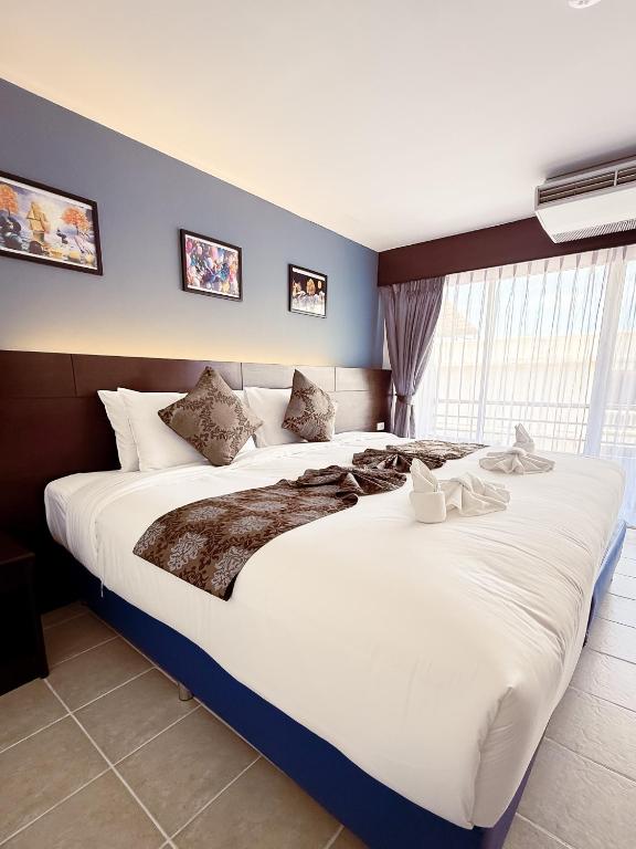 تصویر اتاق‌های The Holiday Resort Pattaya - تصویر ۲