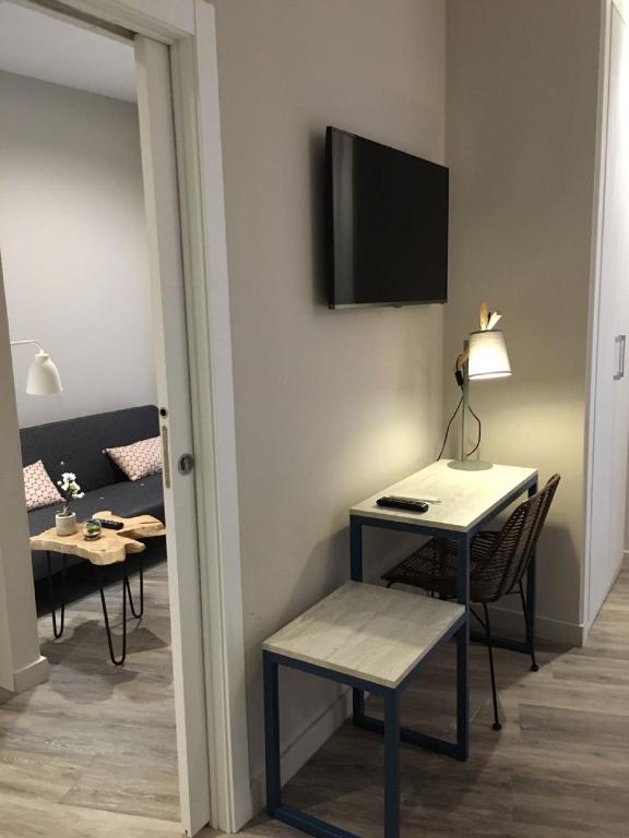 Telewizja i/lub zestaw kina domowego w obiekcie Hotel Boutique Teatro Romano