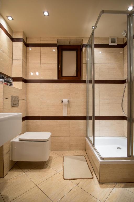 Kúpeľňa v ubytovaní Sentymentalne Kościelisko Apartament & SPA