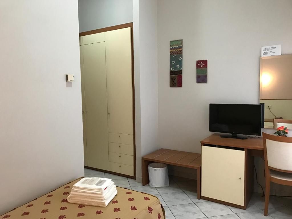 TV a/nebo společenská místnost v ubytování Albergo La Posta Arezzo