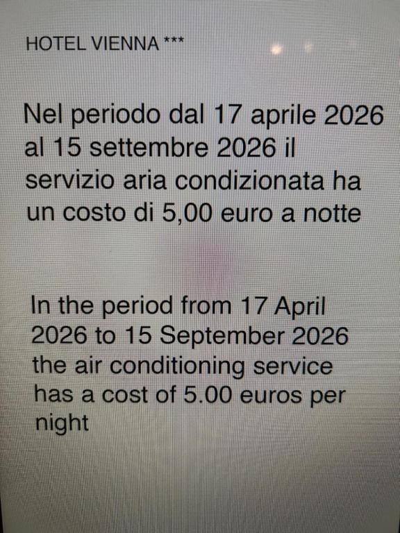 a screenshot of a text message on a cell phone at Hotel Vienna in Milan